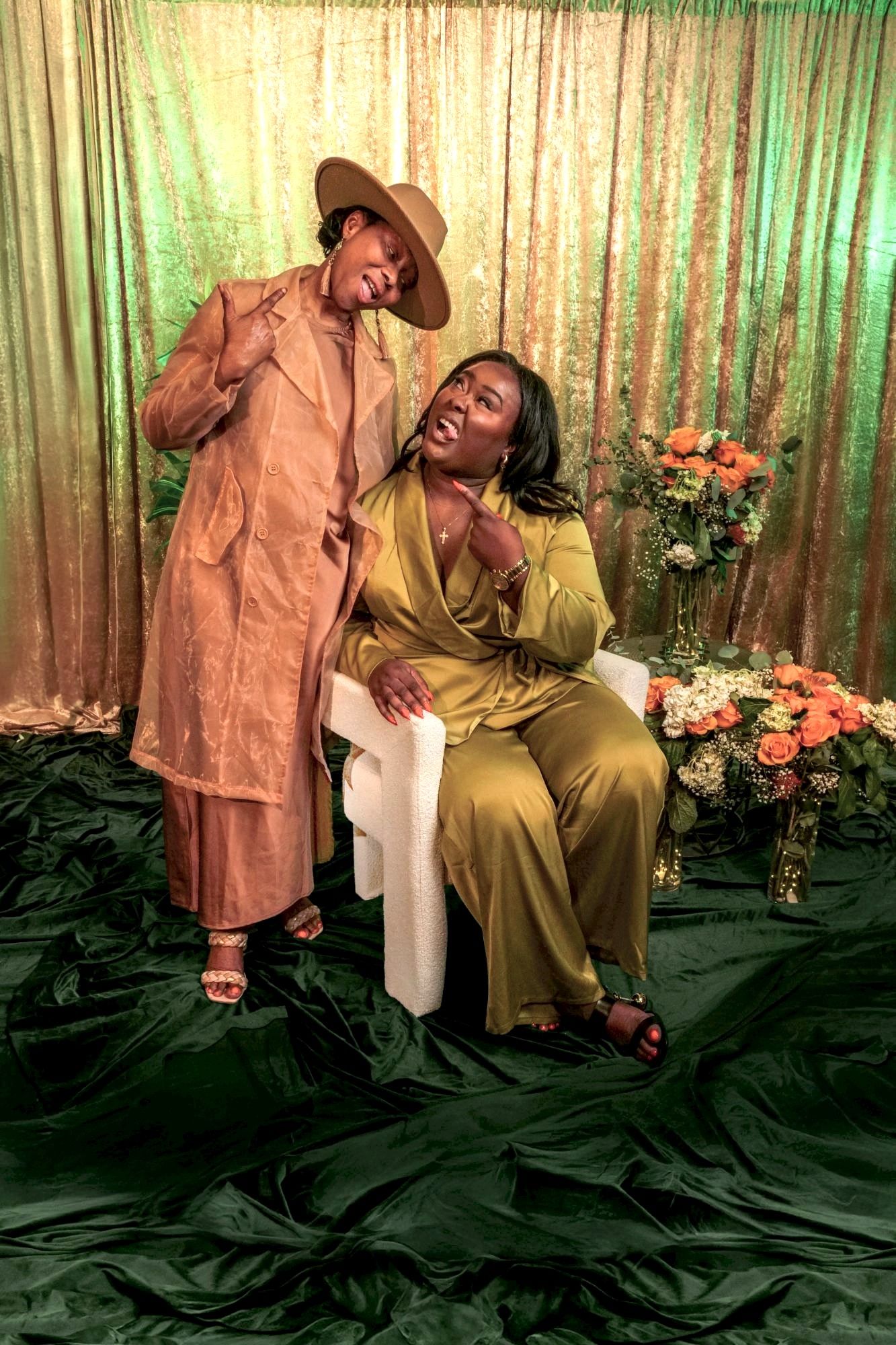 Ona and her mom being playful on a velvet set